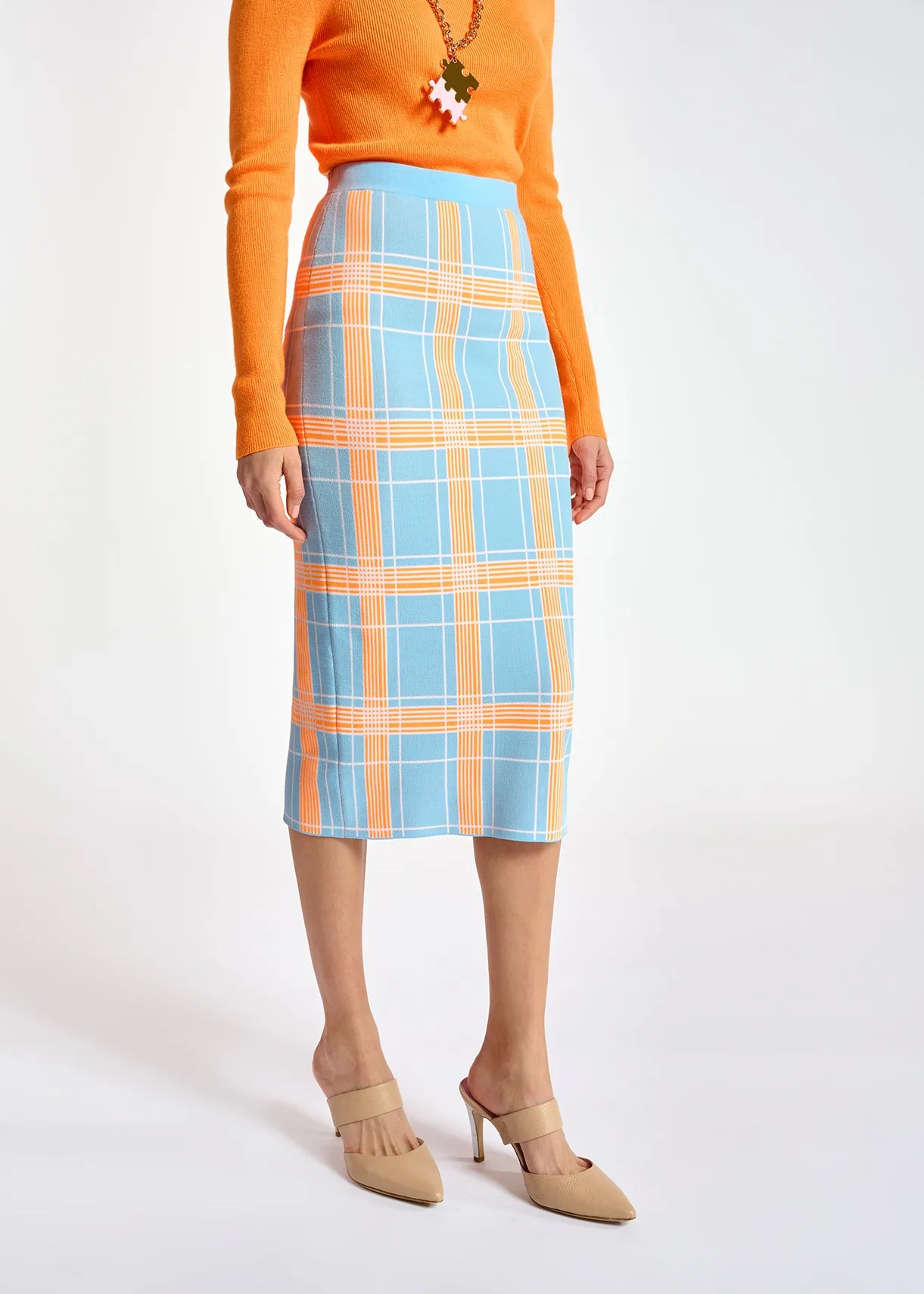 Light blue knitted midi skirt with check motif